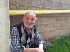 Armenia -- Old man staring at the camera, Yerevan, 15Jun2022